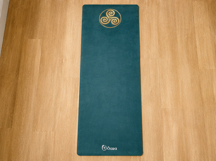 The Triskele yoga mat by Dara Mats, ancient Celtic triple spiral design