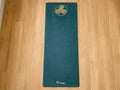 The Triskele yoga mat by Dara Mats, ancient Celtic triple spiral design