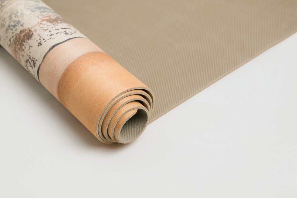 Horizon's Edge yoga mat laid out in a home practice space