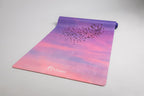 Wonder in the Sky yoga mat by Dara Mats, starling murmuration artwork in an evening sky palette